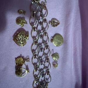 14kt white and yellow gold  with 9 14kt charms